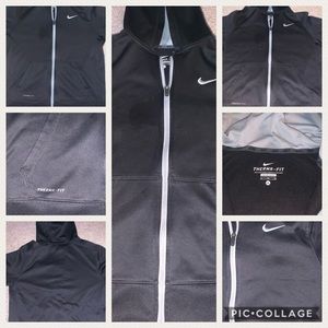 Used black Nike boys jacket.